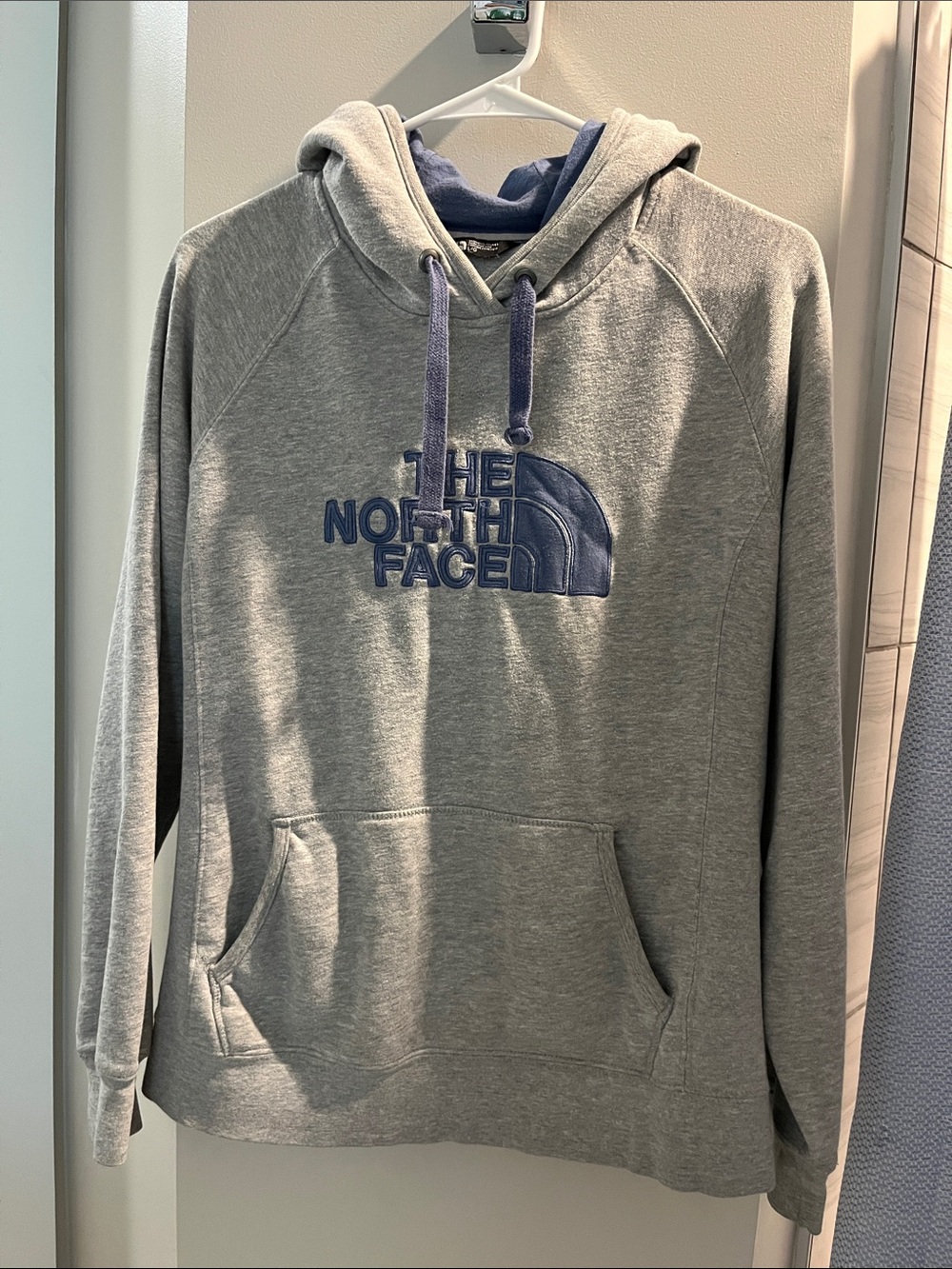 The North Face Gray Hoodie with Blue Logo and Hood Lining